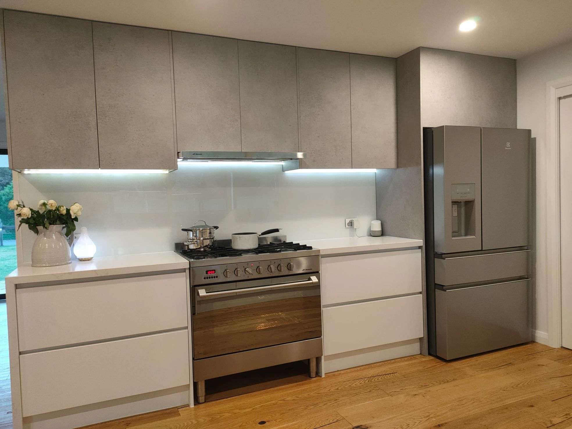Kitchen cabinetry wrapped by Vogue Vinyl Decor